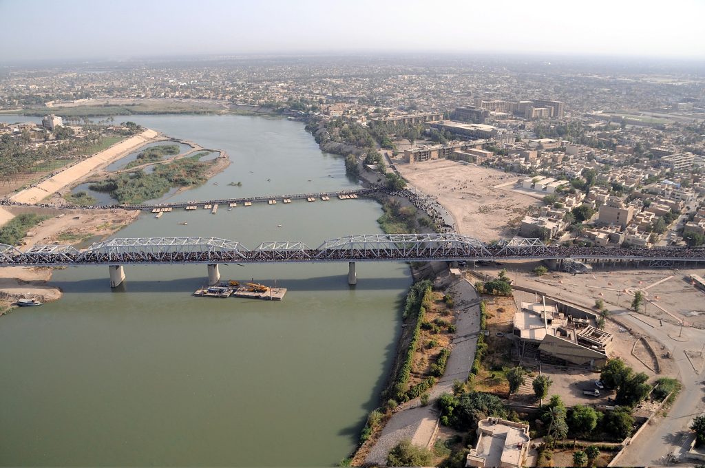 Hundreds of thousands of Shiites make their way across the newly-rebuilt Sarifiyah bridge and a smaller neighboring bridge in their annual pilgrimage to the Kadhamiyah shrine in northern Baghdad, Iraq, July 29, 2008.(Photo by U.S. Army Staff Sgt. Lorie Jewell/Released)